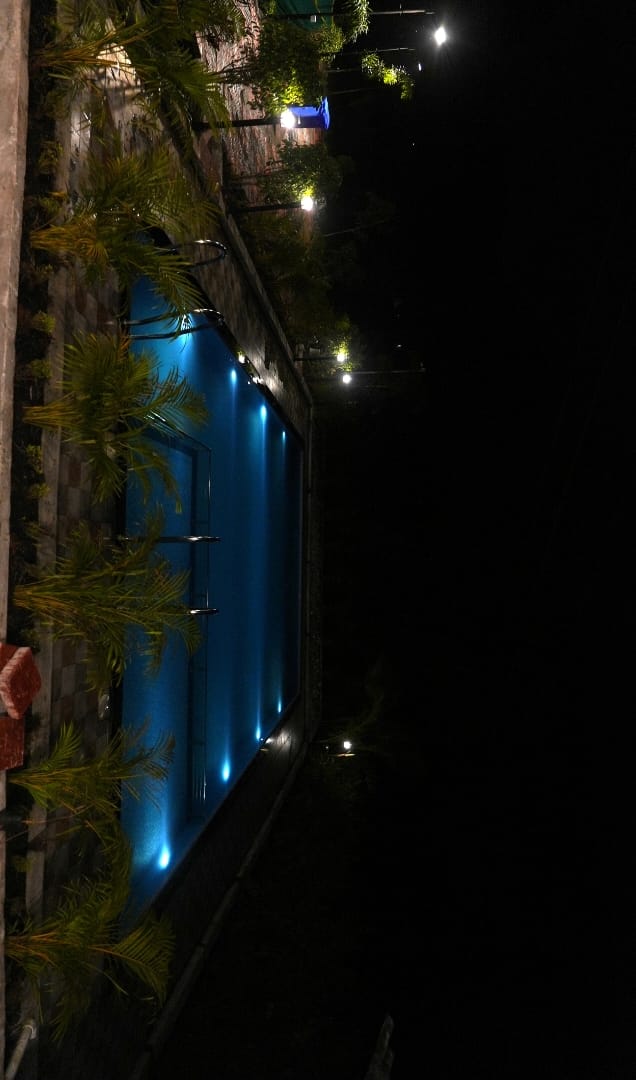 Open grounds at Nature Bliss Karjat farmstay near Mumbai